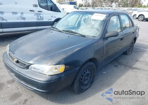 1999 Toyota Corolla Ve z USA, uszkodzony, nr VIN 1NXBR12E4XZ152701